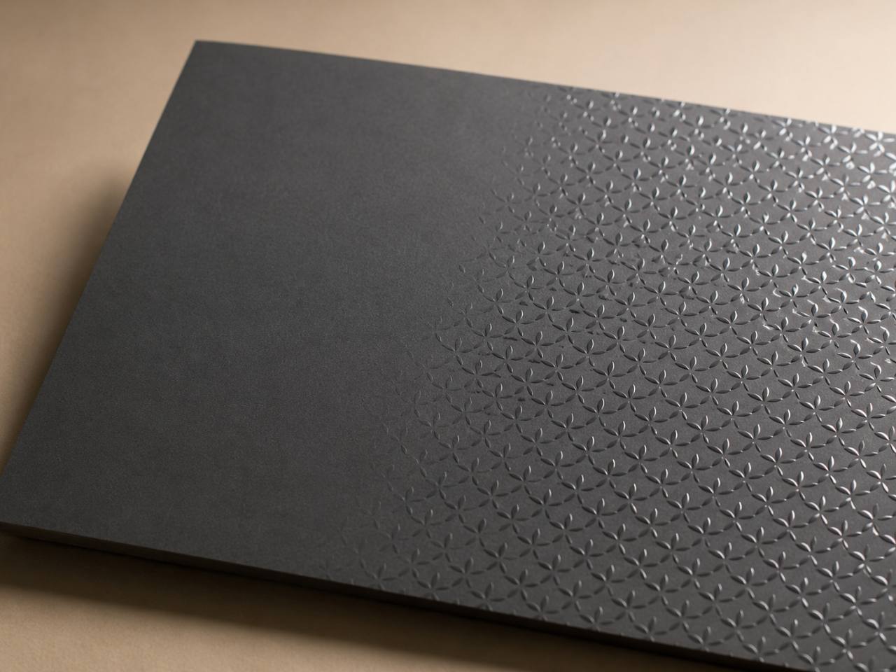 Soft touch matte surface with glossy spot UV pattern